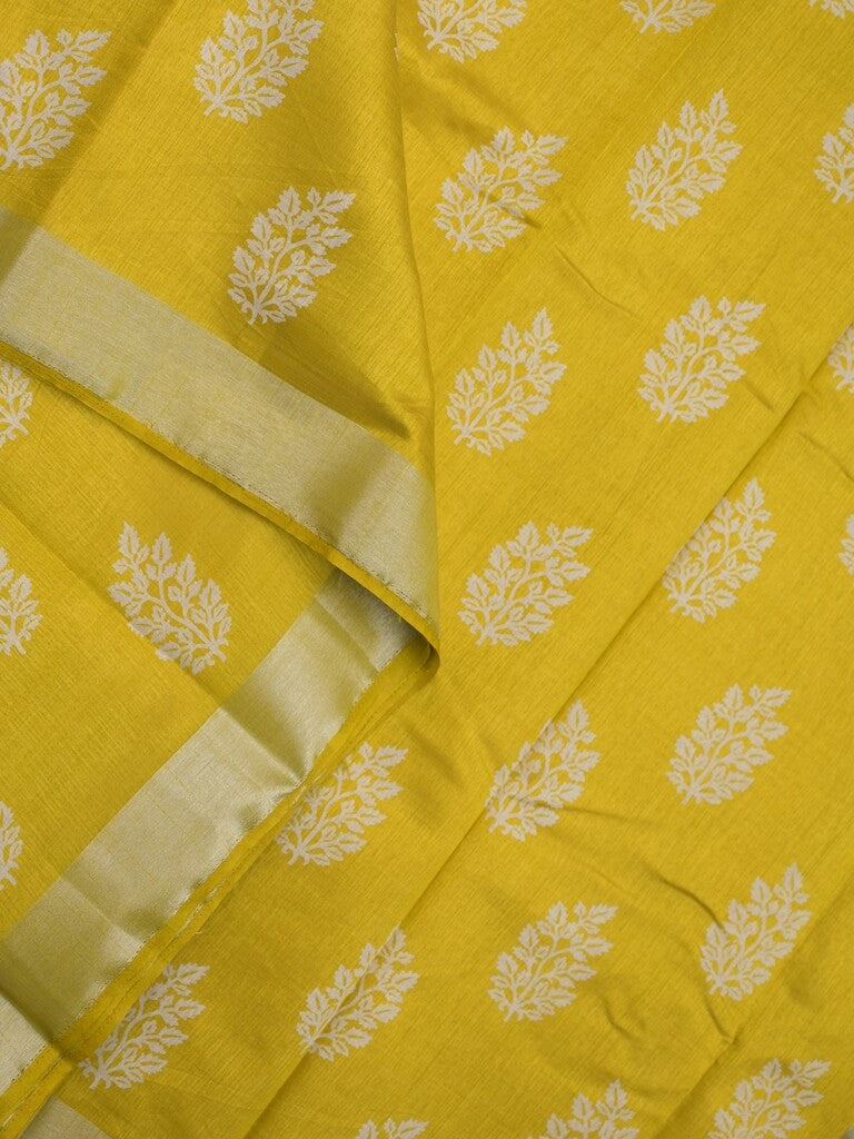 Dupion fancy saree golden yellow color allover motifs & small kaddi border with short pallu and attached plain blouse