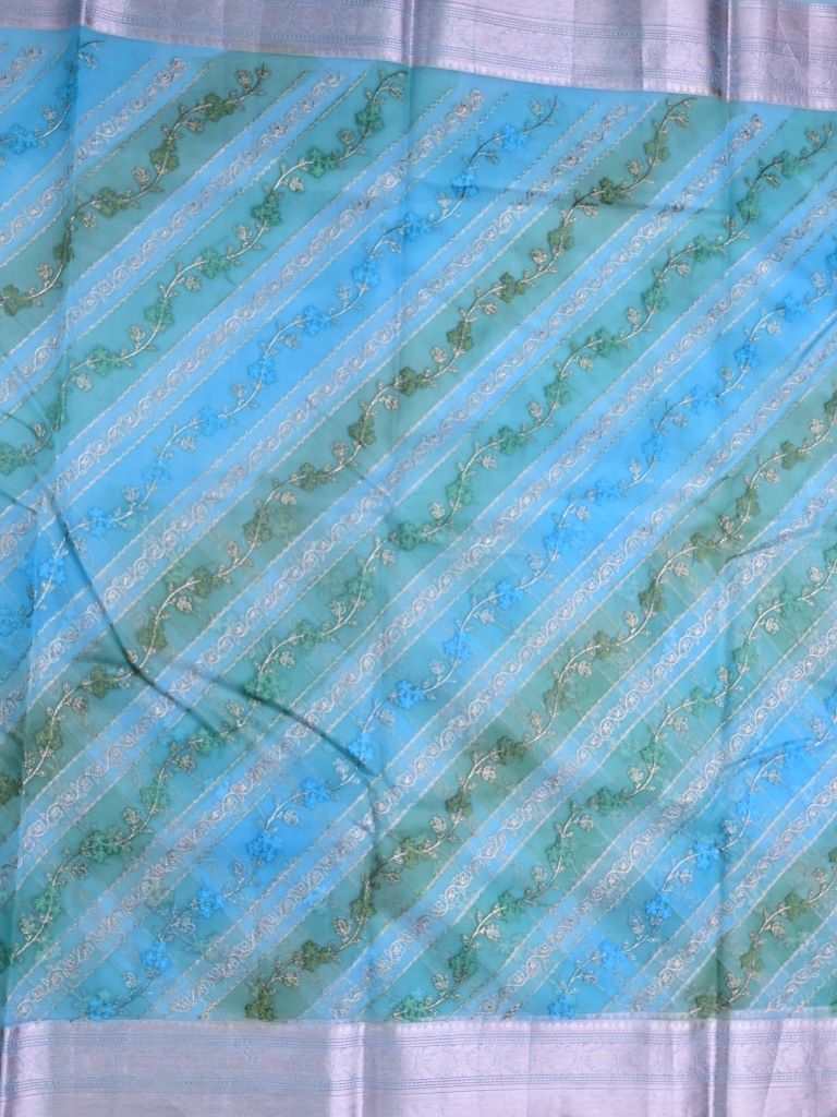 Organza fancy saree sky blue color allover embroidery & zari border with short zari pallu and attached plain blouse