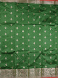 Banaras fancy saree bottle green color allover zari motifs & zari border with rich pallu and contrast plain blouse