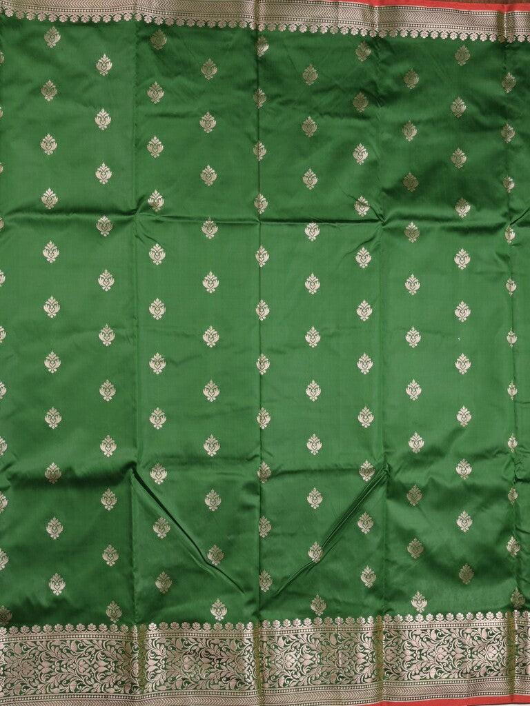 Banaras fancy saree bottle green color allover zari motifs & zari border with rich pallu and contrast plain blouse