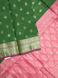 Banaras fancy saree bottle green color allover zari motifs & zari border with rich pallu and contrast plain blouse