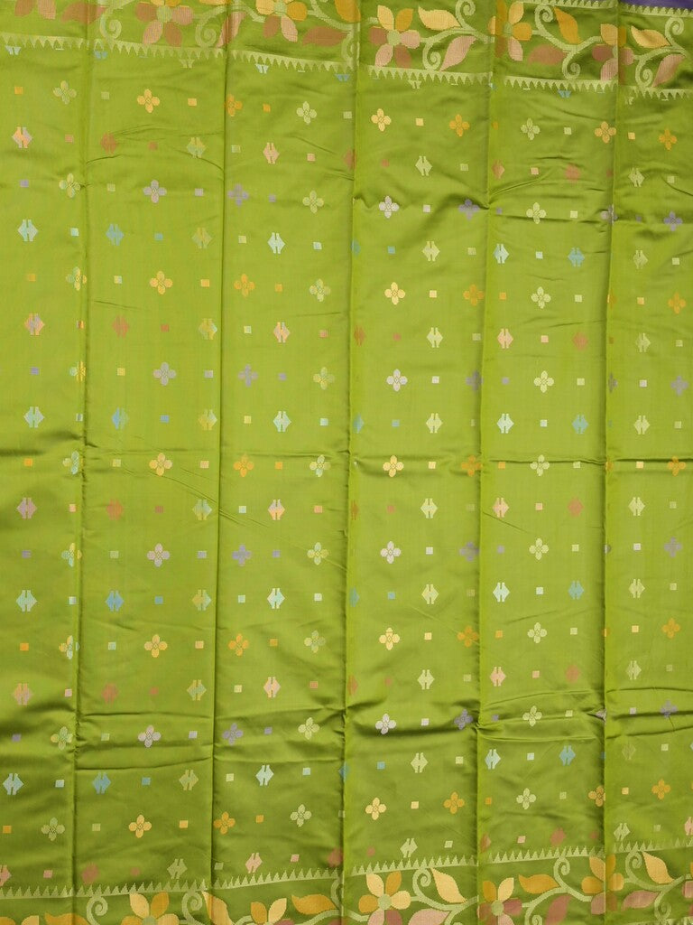 Fancy pattu saree parrot green color allover weaves & small border with self pallu and attached blouse