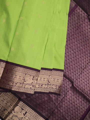 Pethambari pattu saree light parrot green color allover zari motifs & kanchi border with rich pallu and attached plain blouse