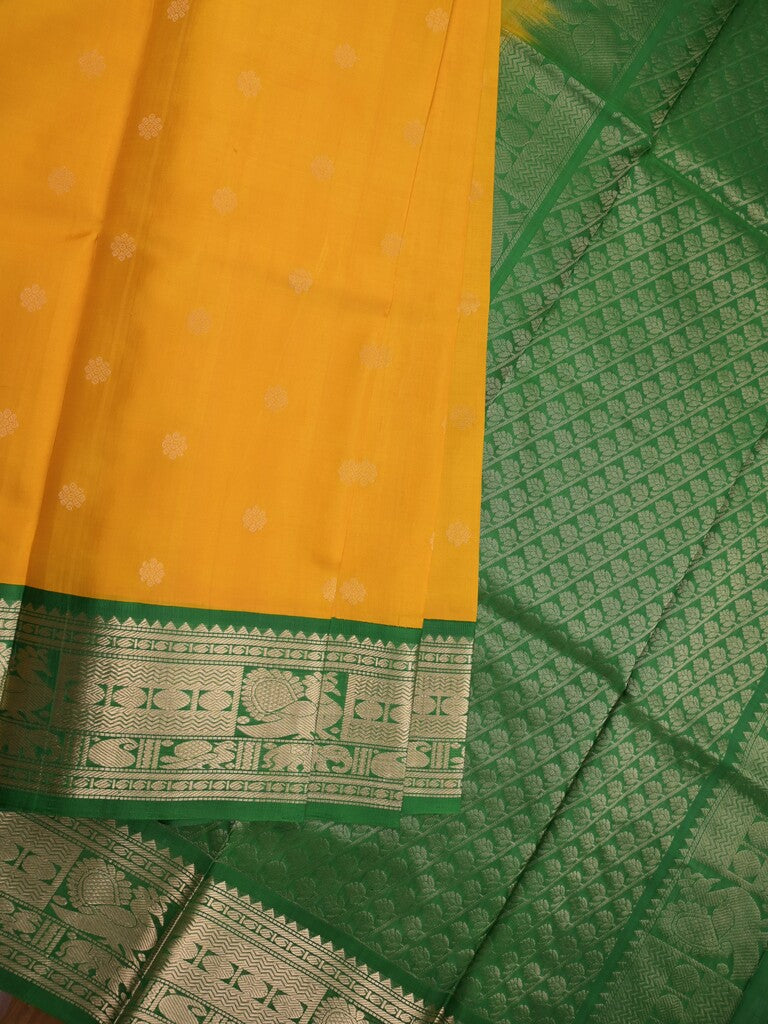 Pethambari pattu saree golden yellow color allover zari motifs & kanchi border with rich pallu and attached plain blouse