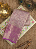 Kanchi tissue pattu saree light purple color allover zari weaves & kanchi border with rich pallu and attached plain blouse