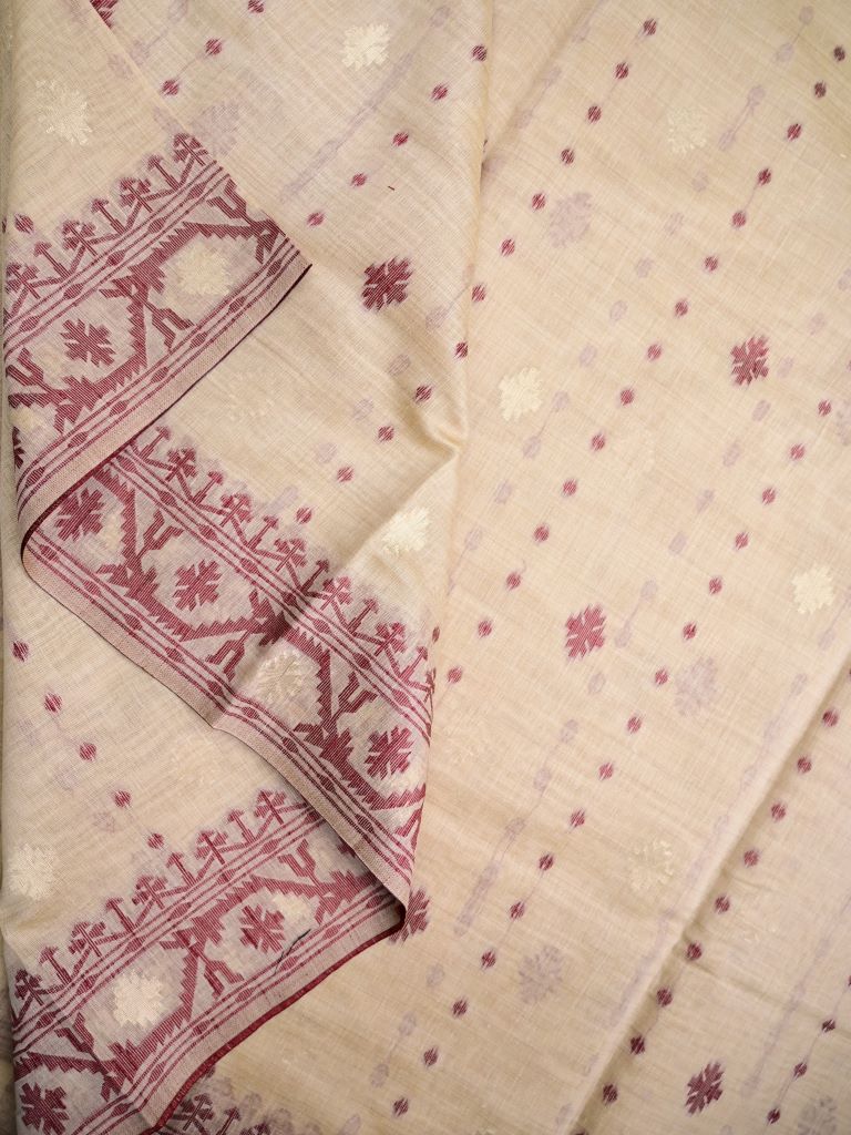 Khadi cotton saree light peach color allover motifs & weaving border with contrast pallu and attached blouse