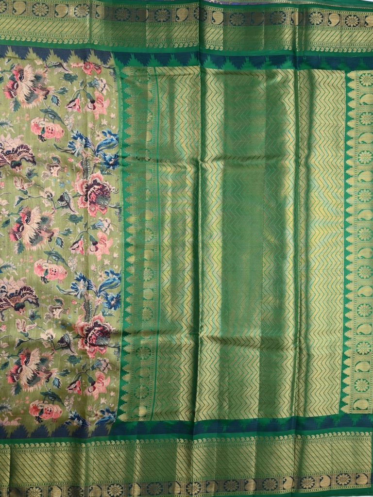 Jute tussar fancy saree sea green color allover digital prints & zari border with brocade pallu and printed blouse