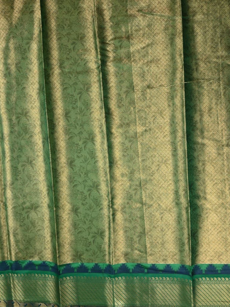 Jute tussar fancy saree sea green color allover digital prints & zari border with brocade pallu and printed blouse