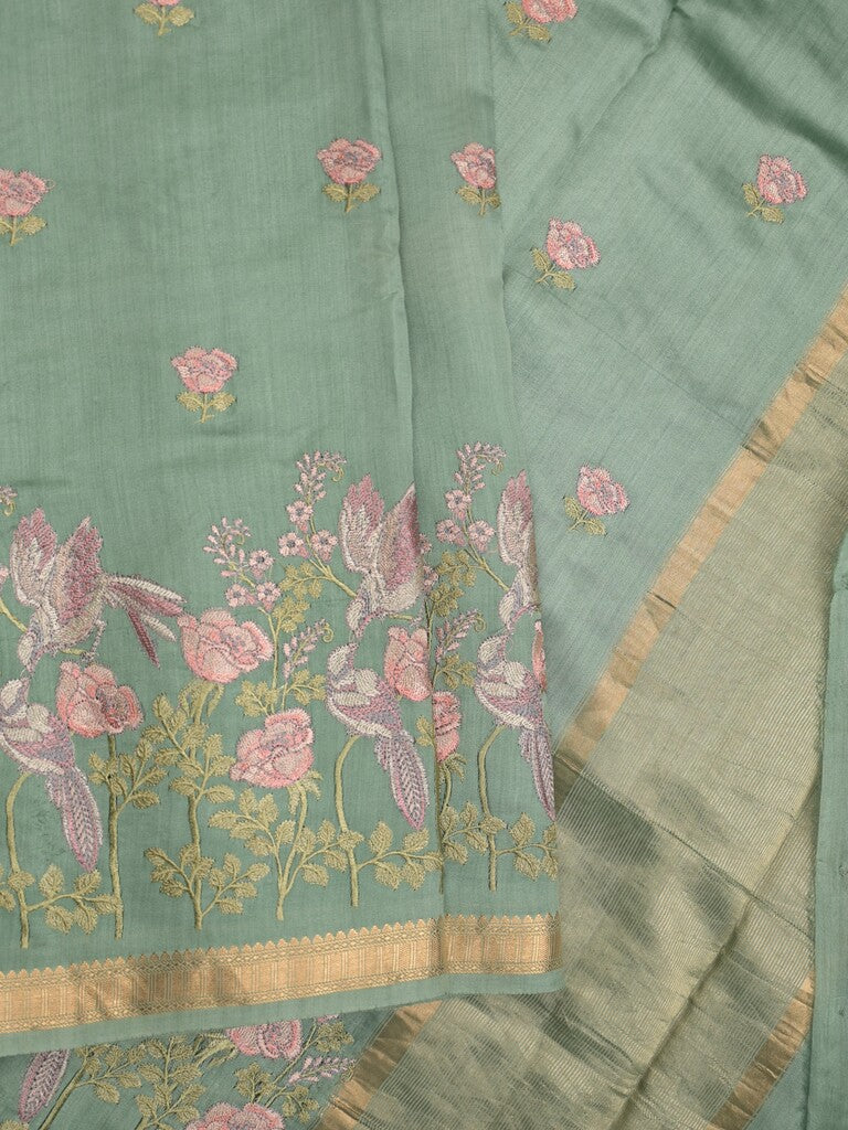Munga pattu saree pista green color allover embroidery butis & small zari border with short pallu and attached plain blouse