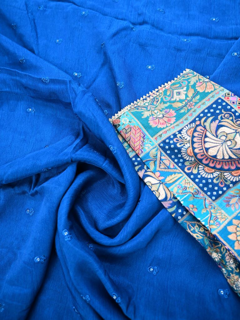 Chinnon fancy saree royal blue color allover embroidery & fancy border with running pallu and stitched blouse