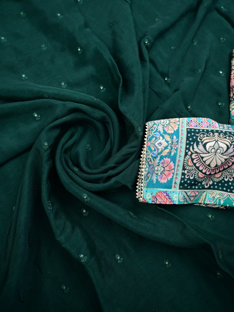 Chinnon fancy saree dark green color allover embroidery & fancy border with running pallu and stitched blouse