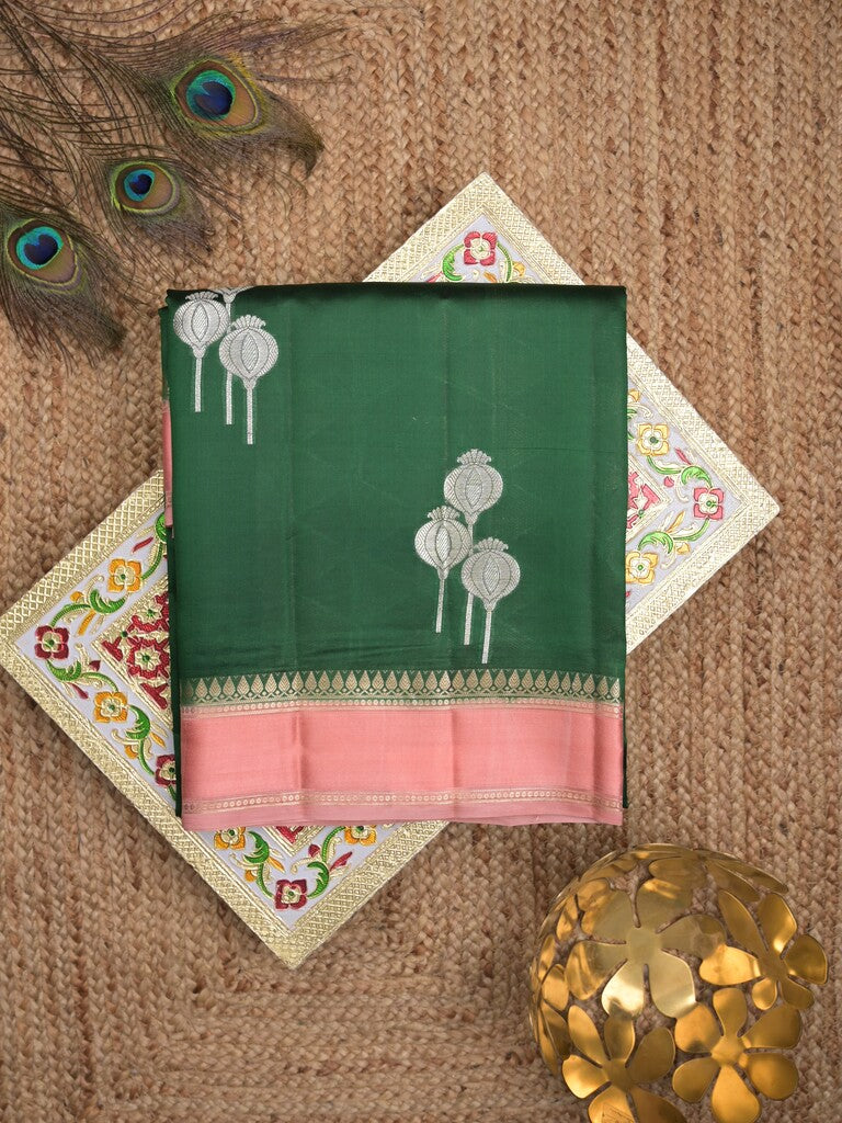 Raw mango pattu saree bottle green color allover zari weaves & small kaddi border with brocade pallu and contrast blouse