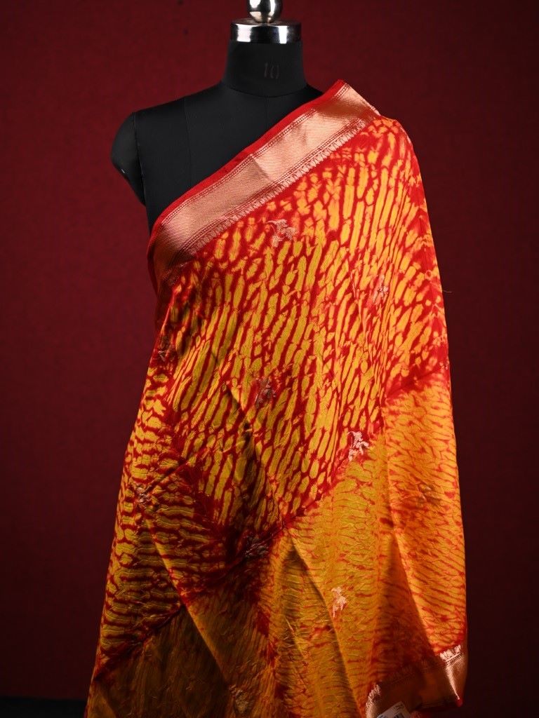 Munga silk dupatta orange color with allover shibori prints and zari border