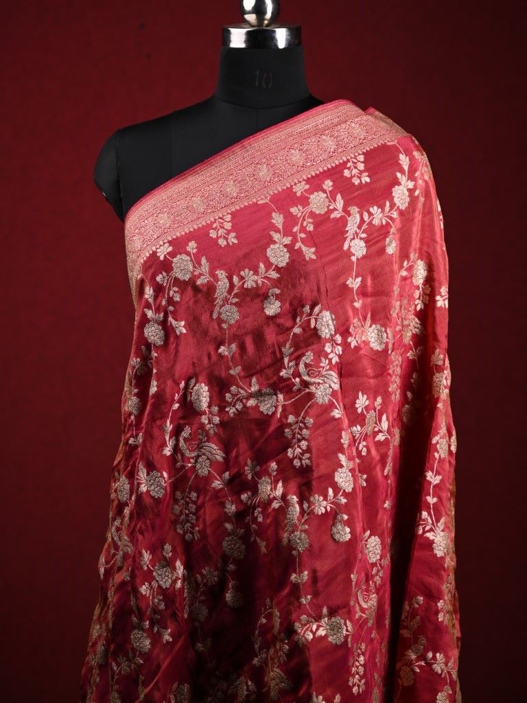 Dola tissue dupatta dark pink color with allover zari weaving with small zari border