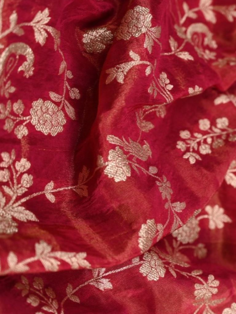 Dola tissue dupatta dark pink color with allover zari weaving with small zari border
