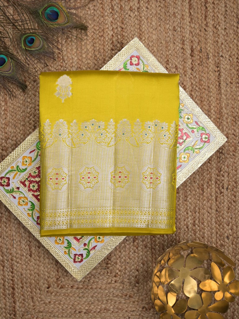Raw mango pattu saree yellow color allover zari weaves & zari border with brocade pallu and contrast blouse