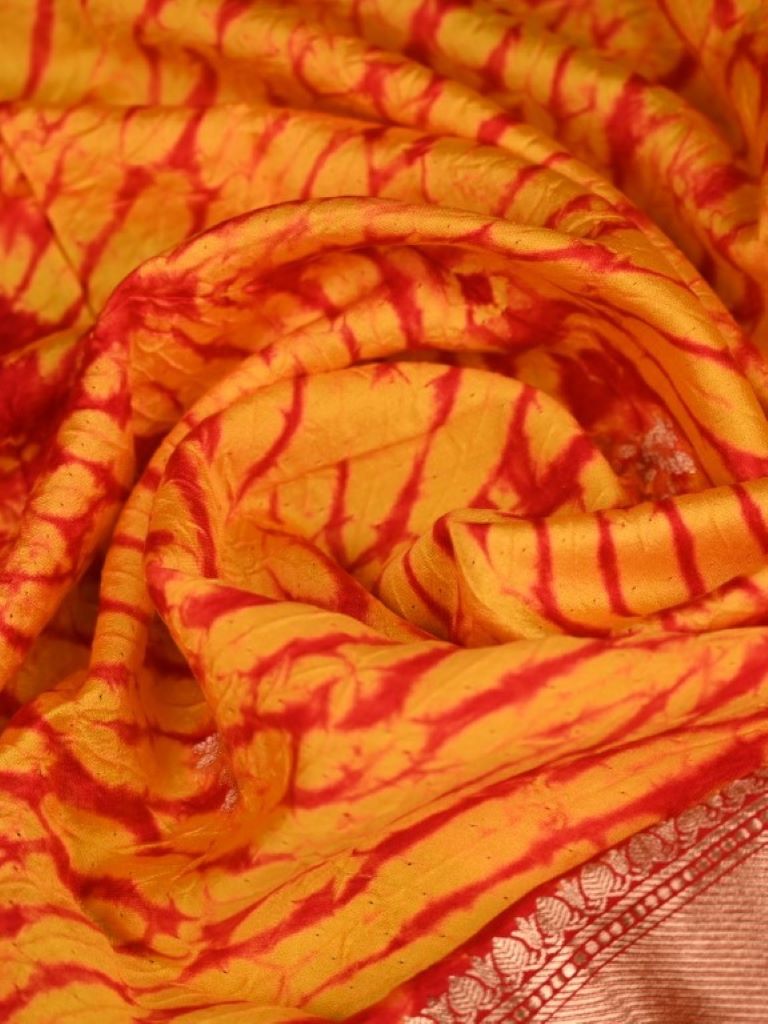 Munga silk dupatta orange color with allover shibori prints and zari border