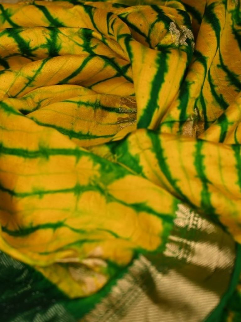 Munga silk dupatta yellow color with allover shibori prints and zari border