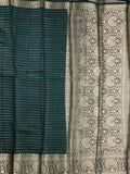 Dupion fancy saree dark green color allover zari stripes & zari weaving border with rich pallu and brocade blouse