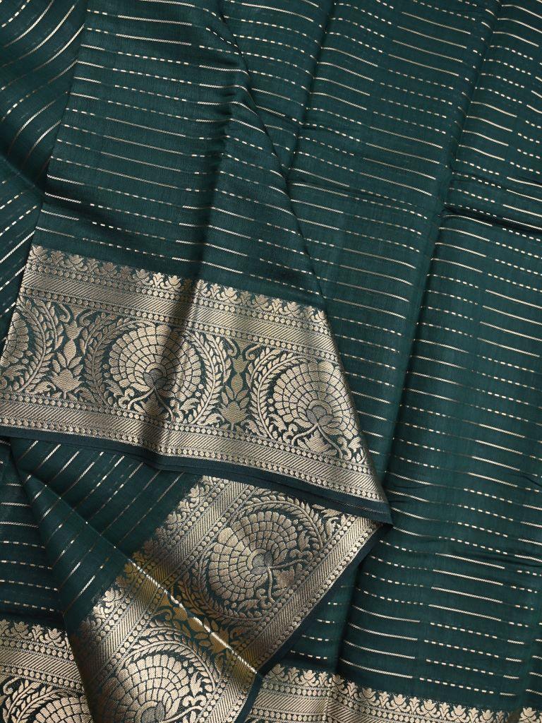 Dupion fancy saree dark green color allover zari stripes & zari weaving border with rich pallu and brocade blouse