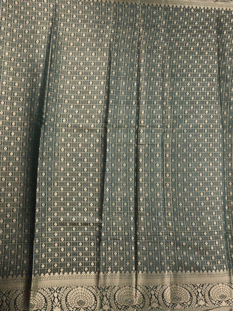 Dupion fancy saree dark green color allover zari stripes & zari weaving border with rich pallu and brocade blouse