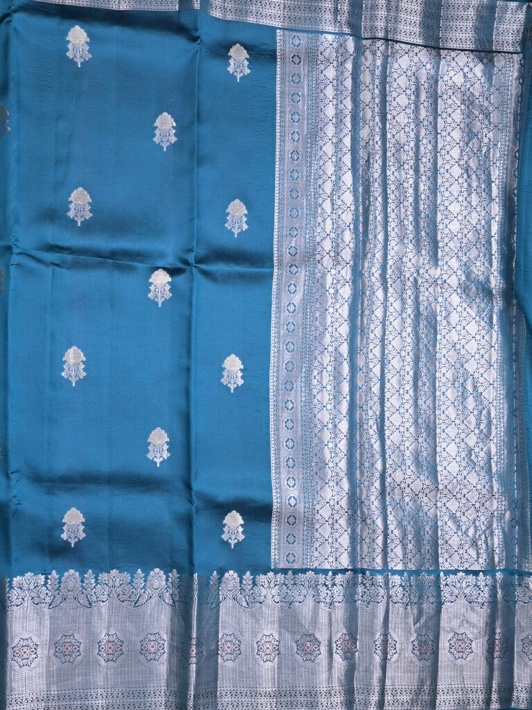 Raw mango pattu saree peacock blue color allover zari weaves & zari border with brocade pallu and contrast blouse