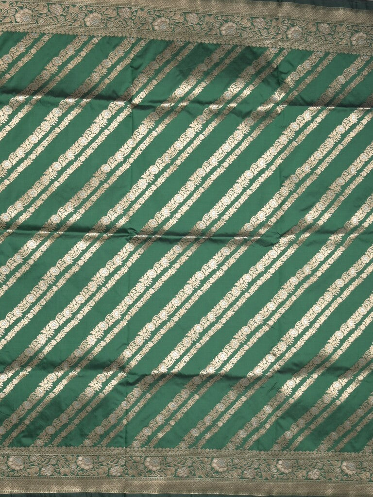 Banaras fancy saree bottle green color allover zari stripes & zari border with rich pallu and attached brocade blouse