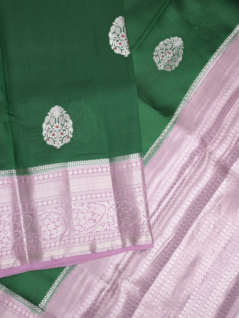 Raw mango pattu saree bottle green color allover zari weaves & zari border with brocade pallu and contrast blouse
