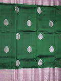 Raw mango pattu saree bottle green color allover zari weaves & zari border with brocade pallu and contrast blouse