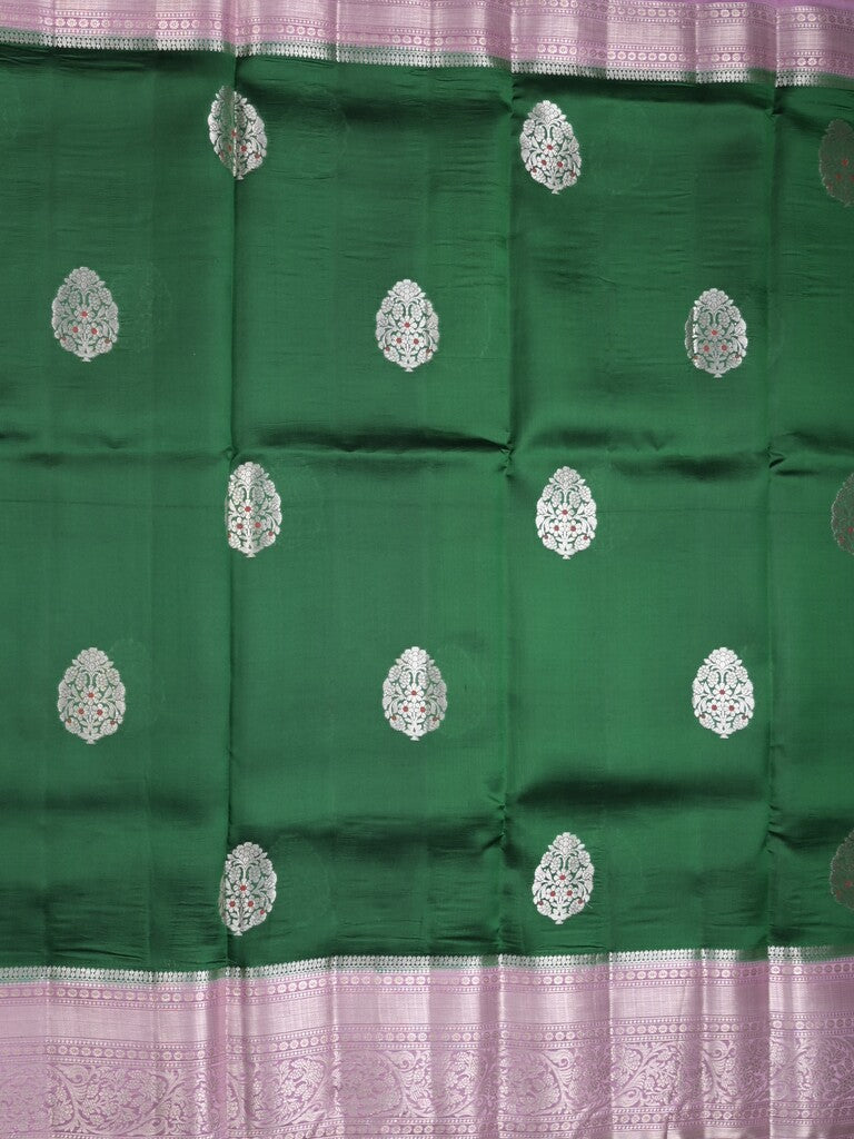 Raw mango pattu saree bottle green color allover zari weaves & zari border with brocade pallu and contrast blouse