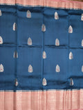 Raw mango pattu saree peacock blue color allover zari weaves & zari border with brocade pallu and contrast blouse