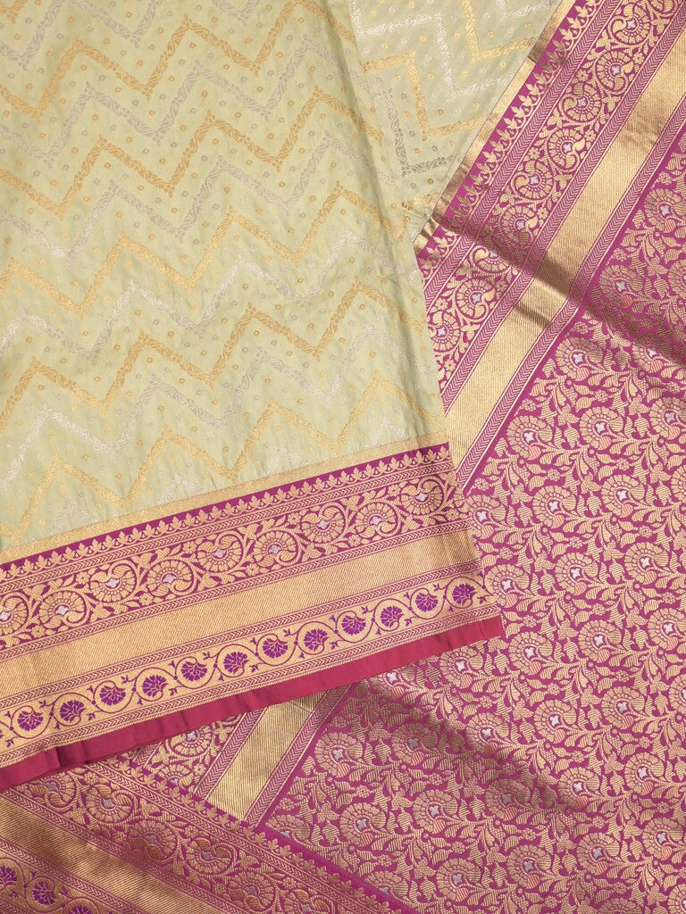 Banaras fancy saree cream color allover zari motifs & zari border with pallu and contrast plain blouse