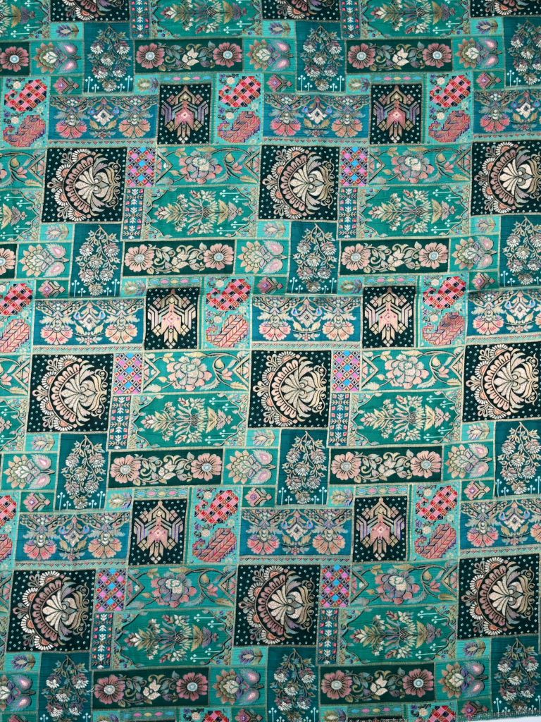 Dola silk fabric peacock green color with allover digital prints