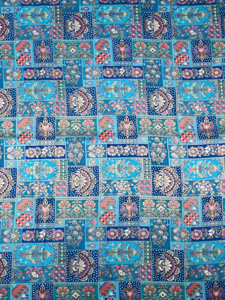 Dola silk fabric blue color with allover zari weaves