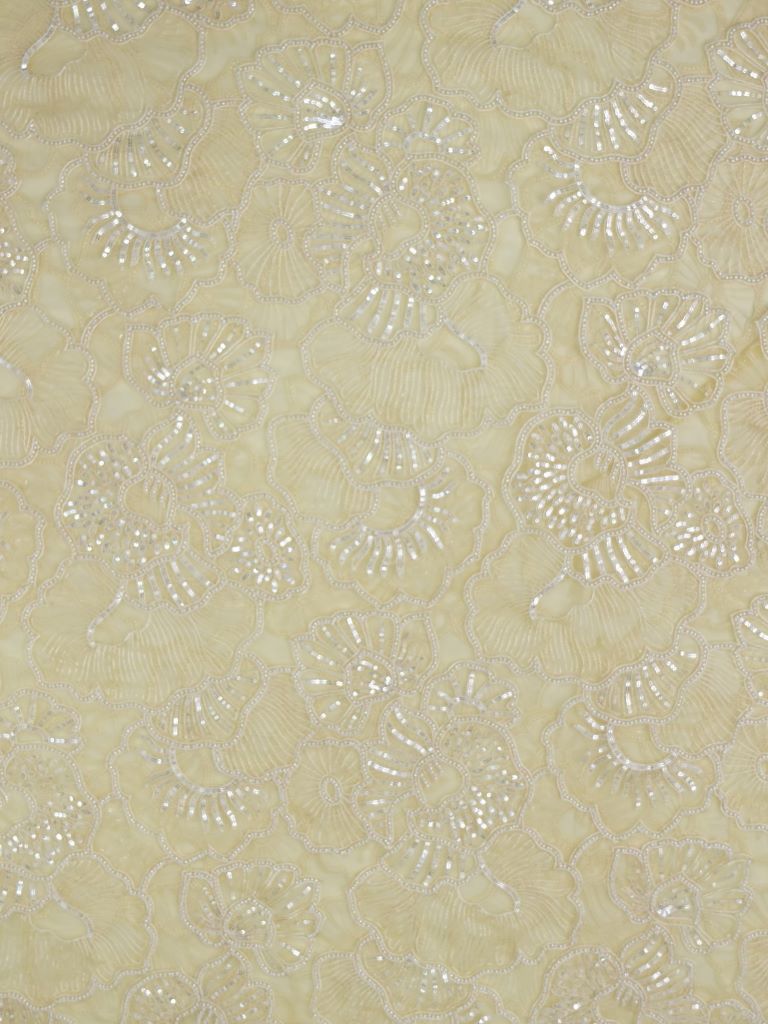 Light yellow color net fabric with allover embroidery work