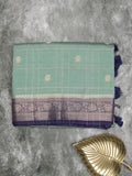 Maheshwari fancy saree lux green color allover checks, zari motifs & zari border with contrast pallu and attached blouse