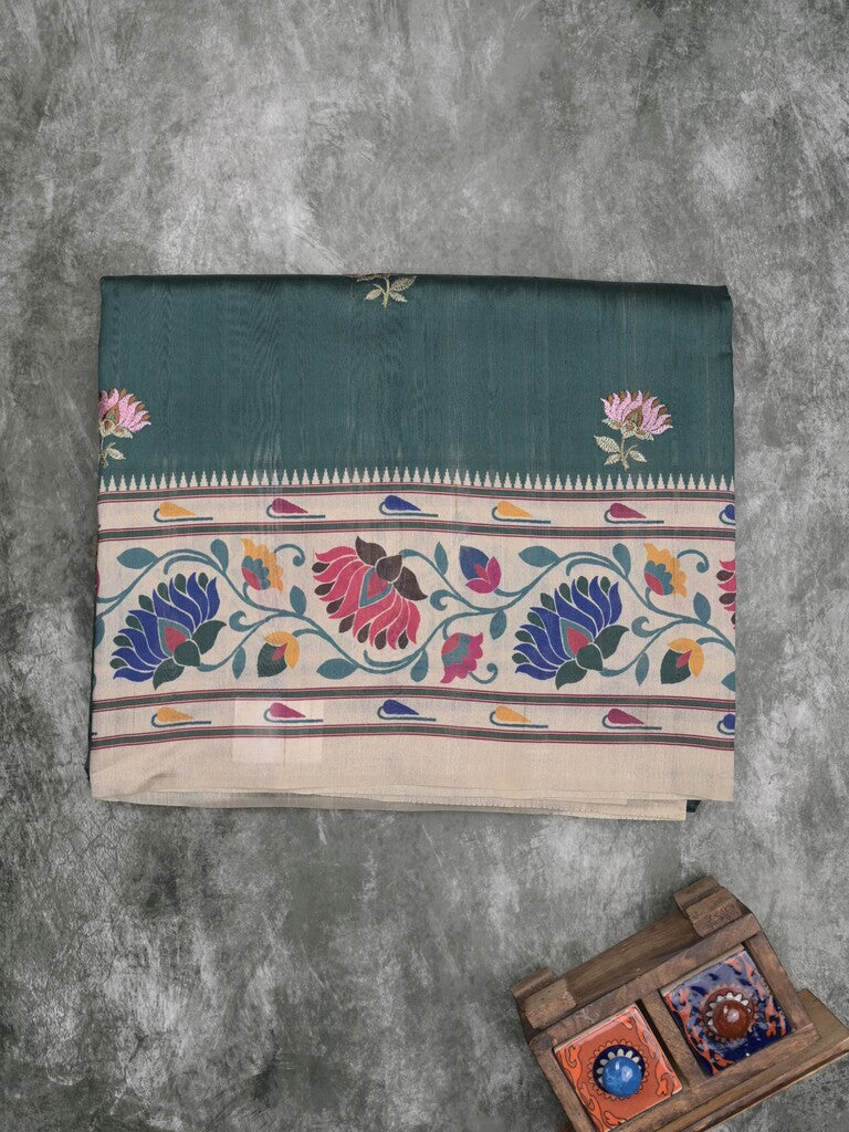 Tussar fancy saree dark green color allover prints & printed border with contrast pallu and printed blouse