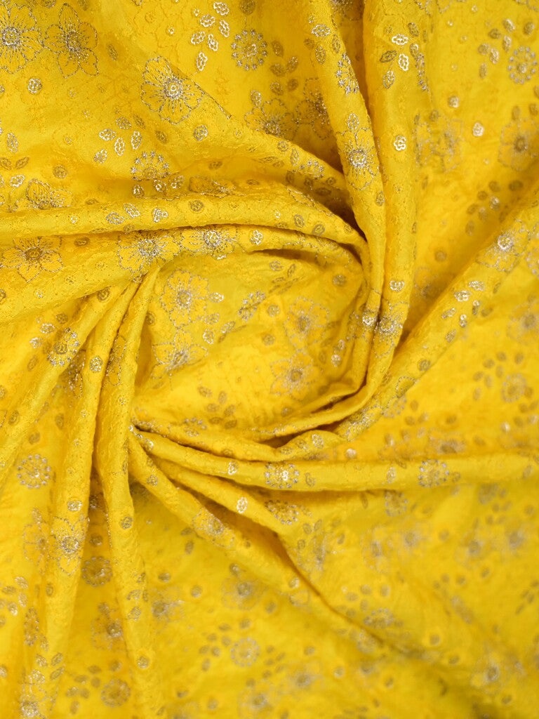 Lemon yellow color dola silk fabric with allover embroidery work