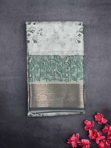 Kota tissue fancy saree light green color allover prints & zari border with printed pallu and printed blouse