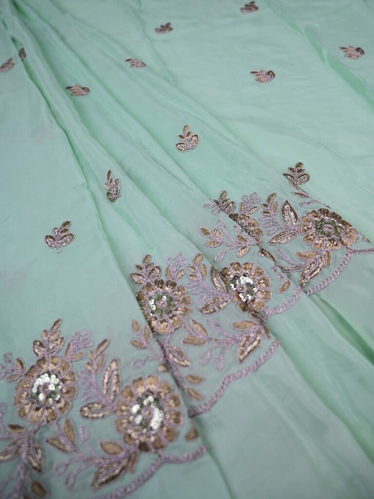 Sea green color crape fabric with allover embroidery work