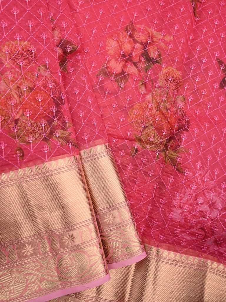 Organza fancy saree coral pink color allover prints and embroidery & zari border with running pallu and plain blouse