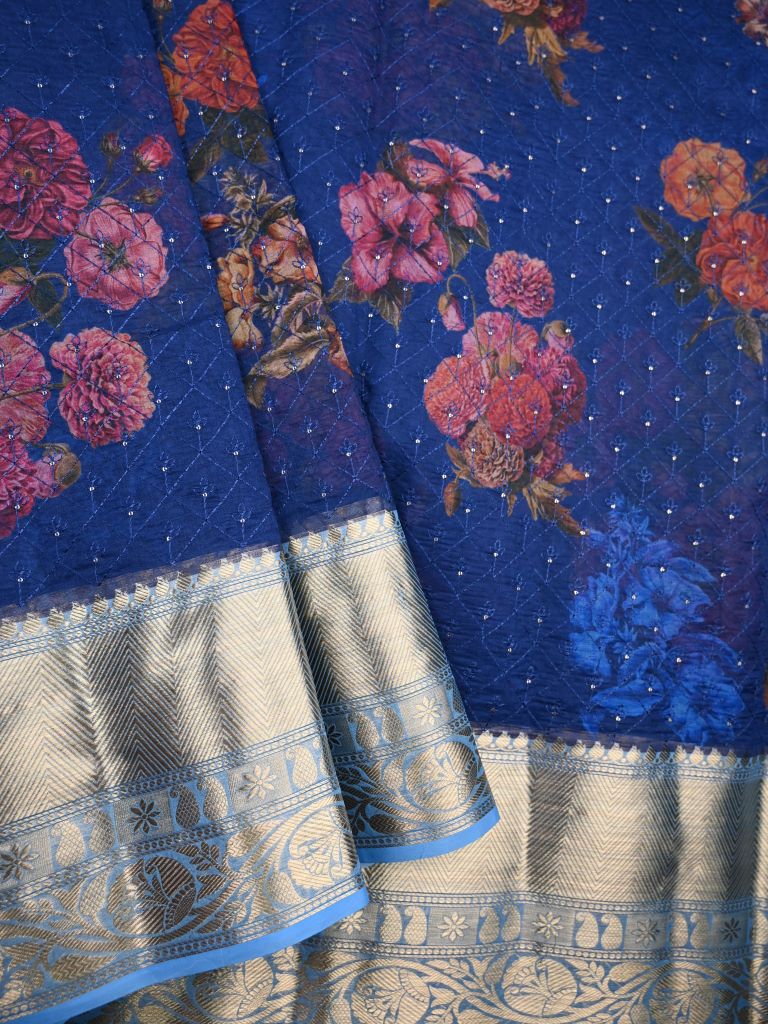 Organza fancy saree royal blue color allover prints and embroidery & zari border with running pallu and plain blouse
