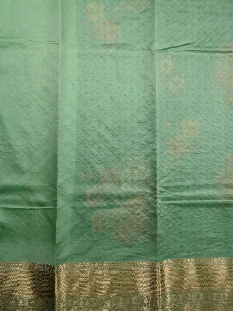 Organza fancy saree bottle green color allover prints and embroidery & zari border with running pallu and plain blouse