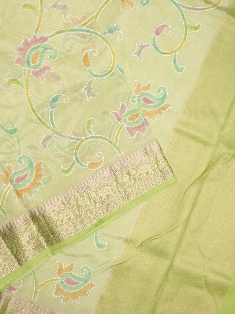 Dupion pattu saree light parrot green color allover weaves & zari border with short zari pallu and attached plain blouse