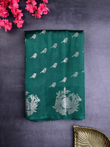 Raw mango silk fancy saree bottle green color allover zari weaves & zari border with short brocade pallu and brocade blouse