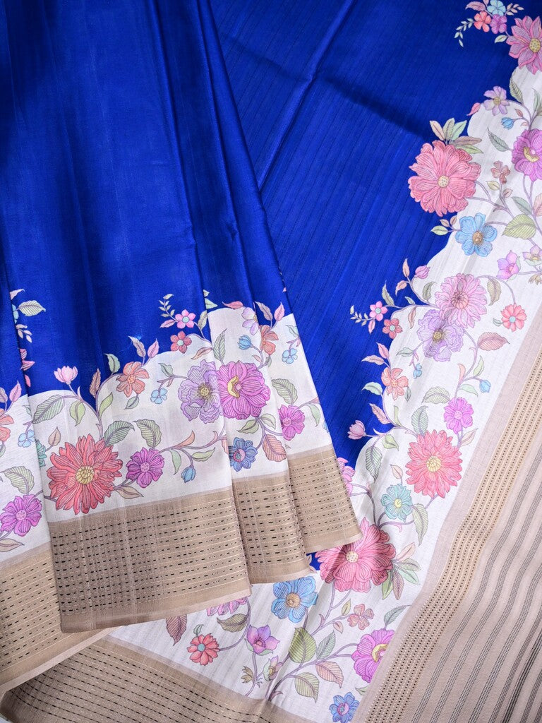 Tussar fancy saree royal blue color allover plain & printed, zari border with short pallu and contrast printed blouse