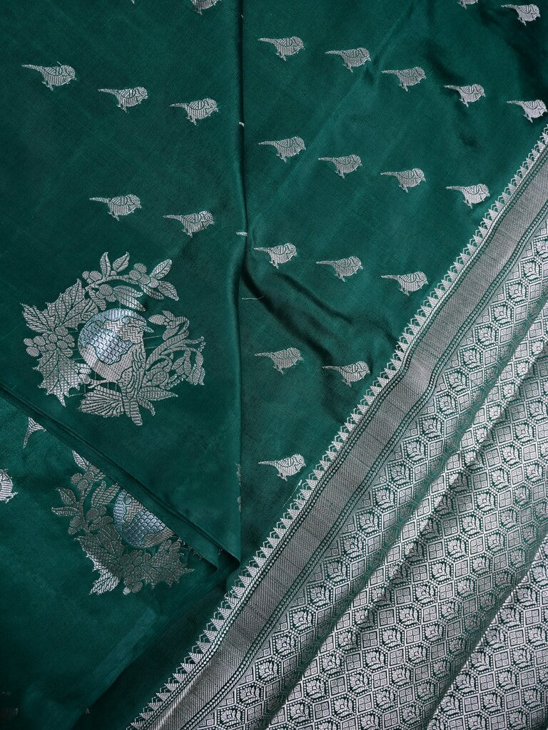 Raw mango silk fancy saree bottle green color allover zari weaves & zari border with short brocade pallu and brocade blouse