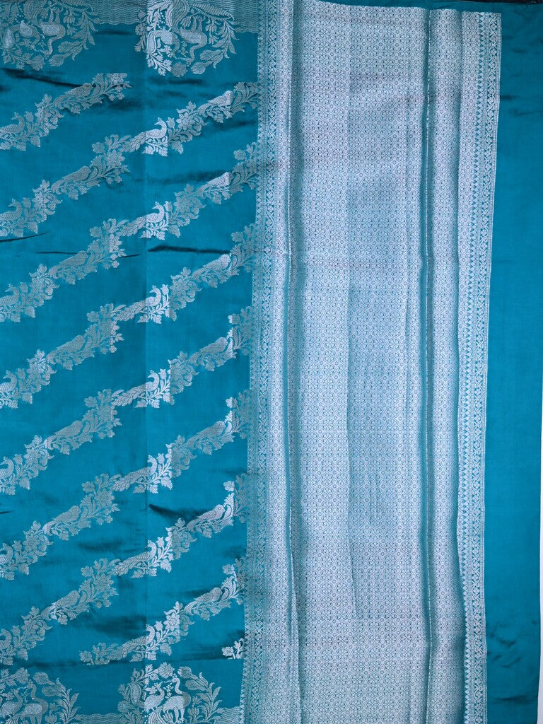 Raw mango silk fancy saree sky blue color allover zari weaves & zari border with short brocade pallu and brocade blouse