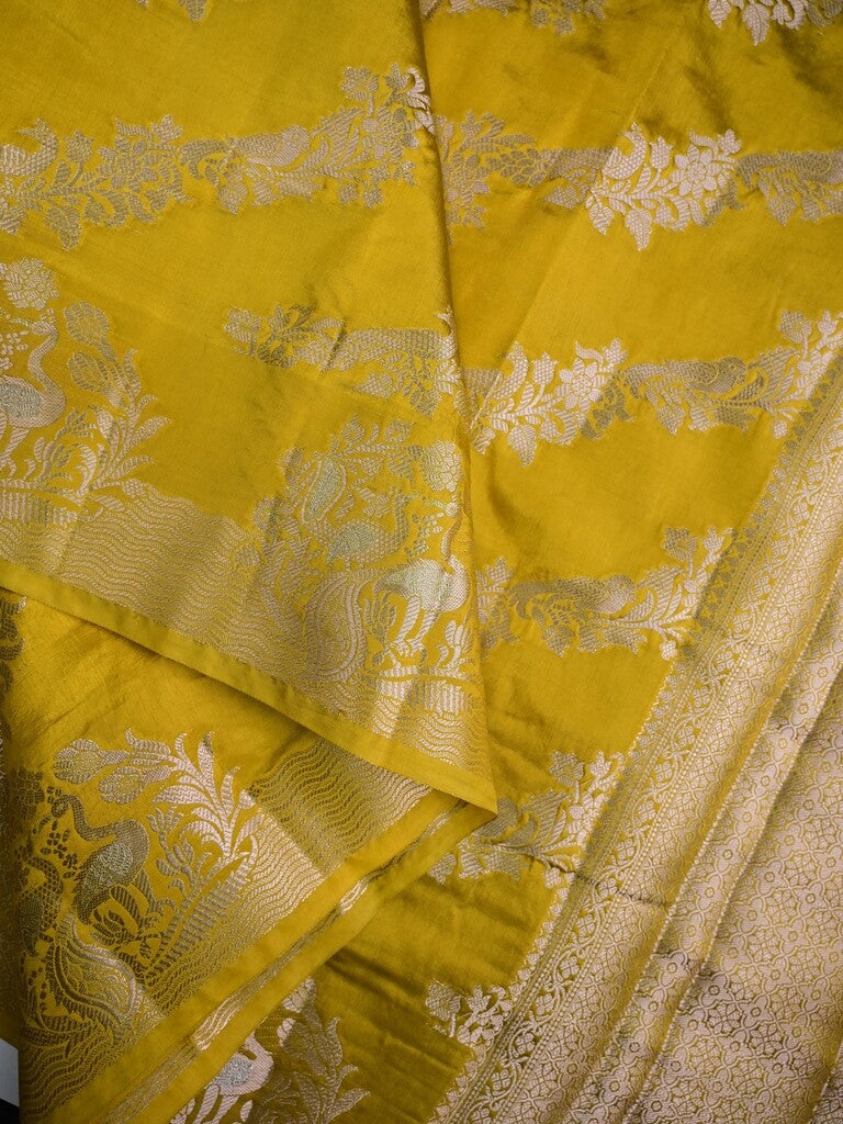 Raw mango silk fancy saree golden yellow color allover zari weaves & zari border with short brocade pallu and brocade blouse