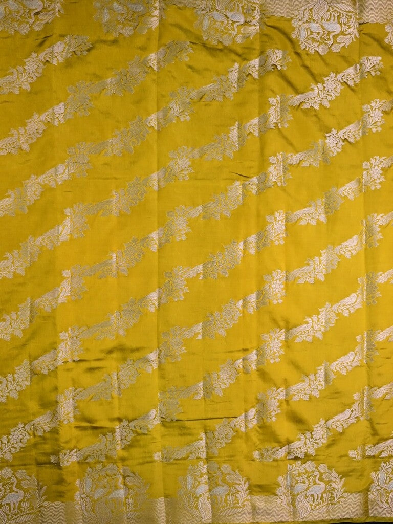 Raw mango silk fancy saree golden yellow color allover zari weaves & zari border with short brocade pallu and brocade blouse